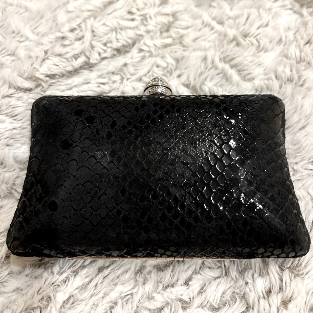 Gorgeous snakeskin print clutch with optional chain for crossbody
